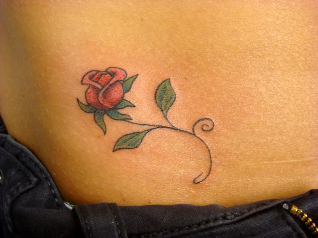 rose tattoos for women. hip-high rose tattoo in